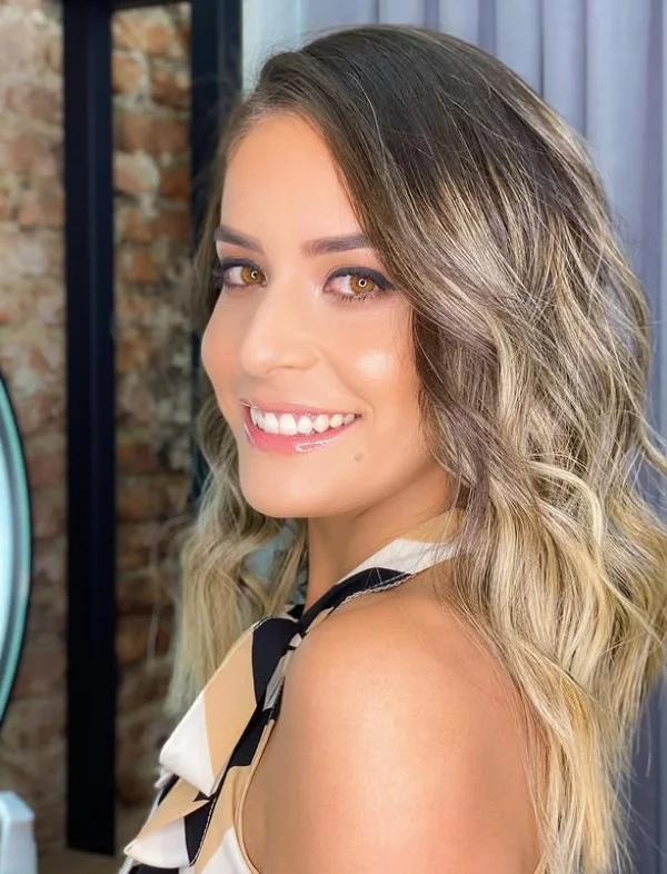 romantic medium length beach waves hairstyle with soft volume