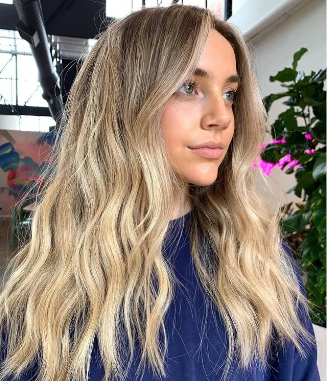 tousled vacation beach waves hairstyle for medium hair