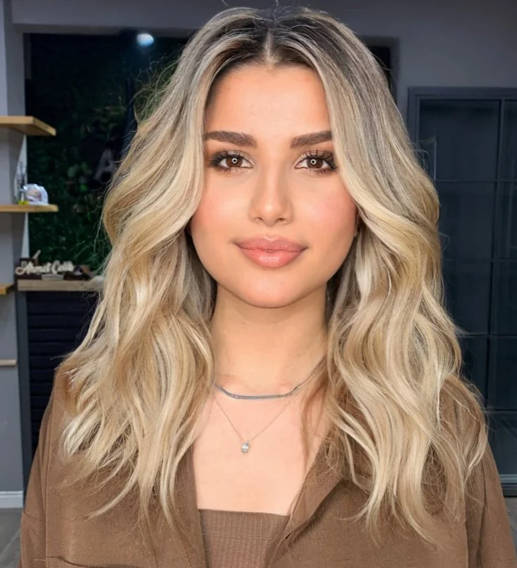 medium beach waves hairstyle with lifted roots and body