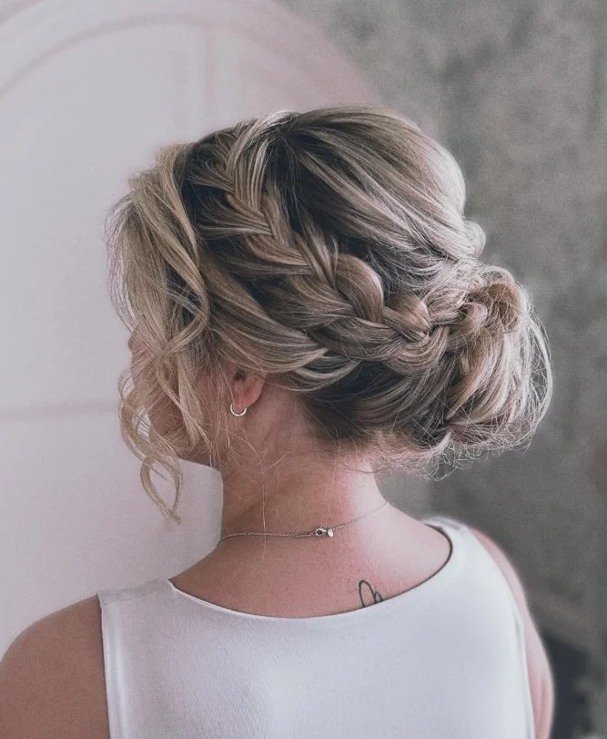 loose braided updo hairstyle for beach wedding guest hair