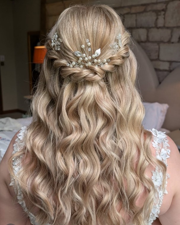 twisted half up crown hairstyle for beach wedding guest hair