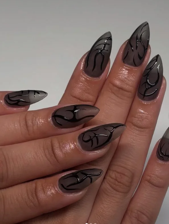 Abstract black almond nails design creative artistic modern nail art style