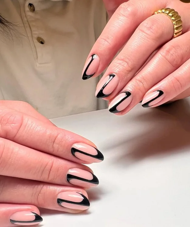 Black almond nails design with line art minimal geometric modern nail inspiration