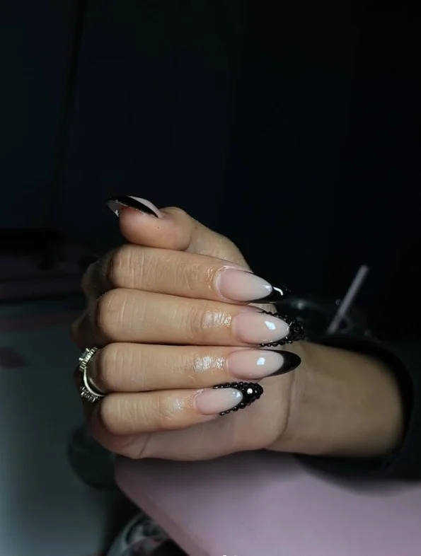 Black almond nails design with rhinestones glamorous sparkling luxury nail manicure