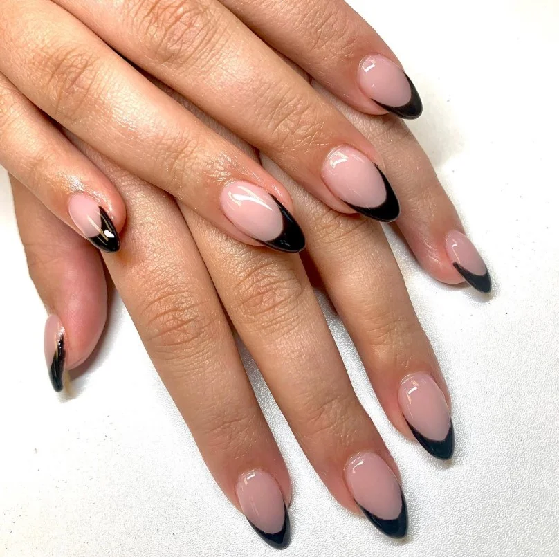 Black French tip almond nails design modern twist on classic French manicure style