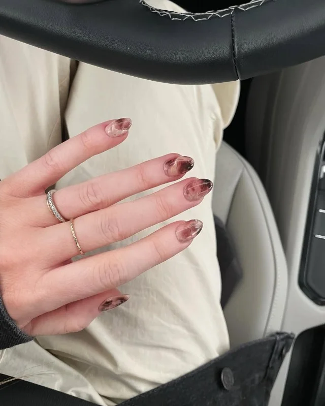 Brown marble effect almond nails artistic soft blended nail design
