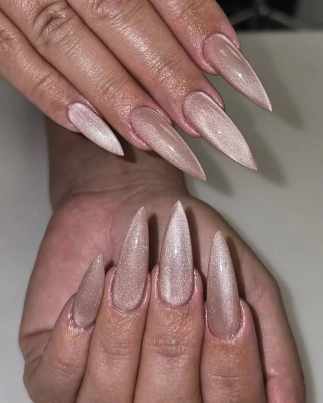 Cashmere brown almond nails with a soft luxury-inspired neutral manicure.