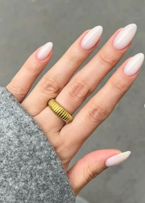 Milky white elegant classy almond nail designs with clean modern manicure style