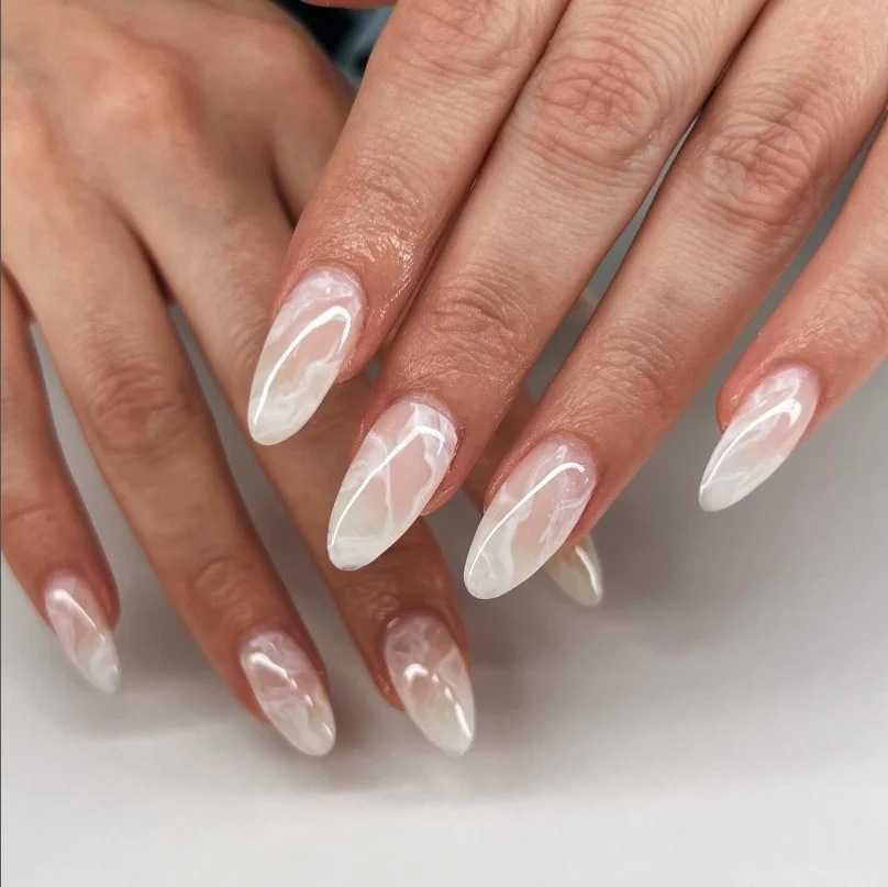 Neutral marble elegant classy almond nail designs with luxury stone-inspired effect