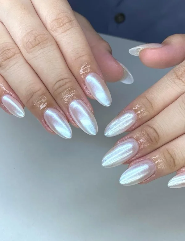 Pearl glazed elegant classy almond nail designs with luxury shimmer finish