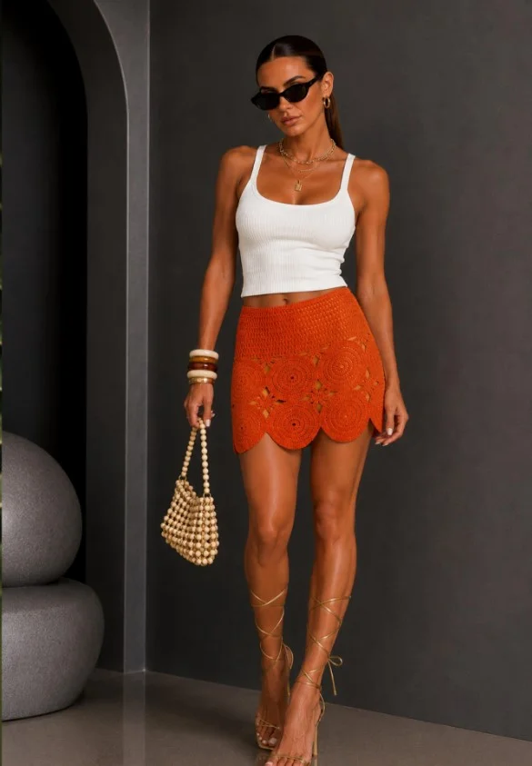 Crochet mini skirt outfit paired with fitted bodysuit for a flattering silhouette