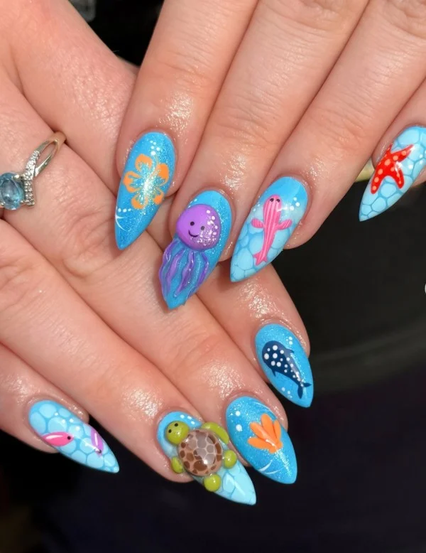 Sea turtle summer 3D nail designs with ocean blue nail art and textured details.