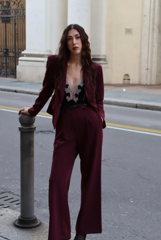 Silk camisole paired with a structured blazer for a polished outfit.