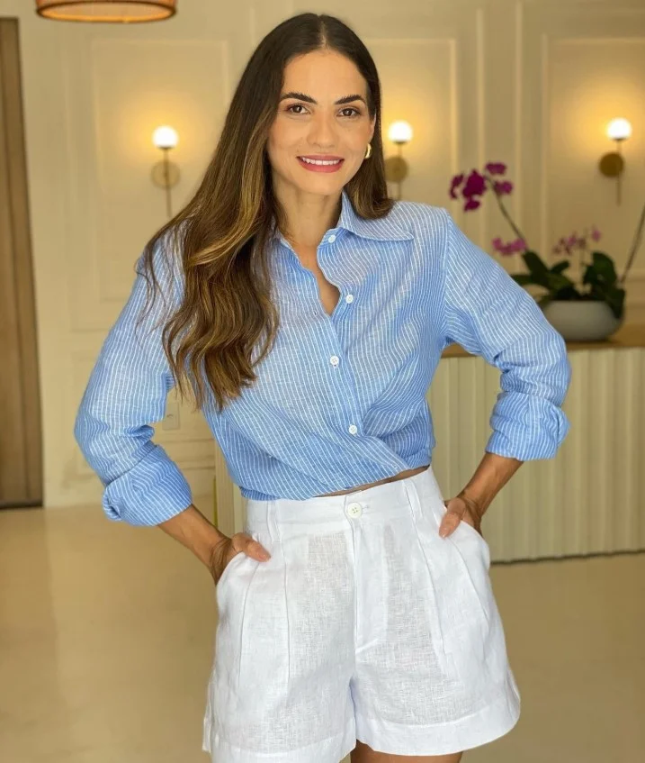 Classic striped shirt paired with linen shorts for an effortless summer style.
