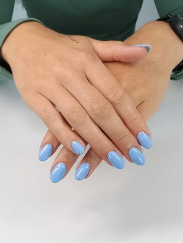 Powder blue manicure flattering pale skin with cool undertones