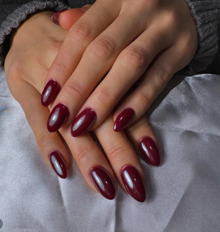 Burgundy chrome fall nail designs with a sleek mirror finish for a modern manicure.