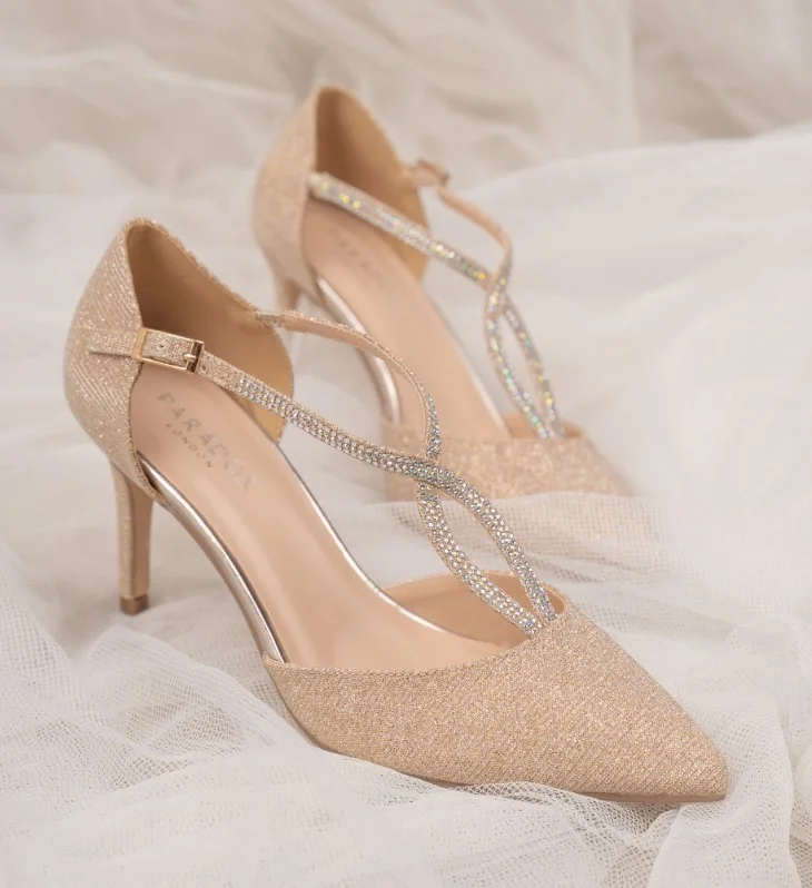 Elegant blush pink dress paired with champagne heels for a refined special occasion outfit.
