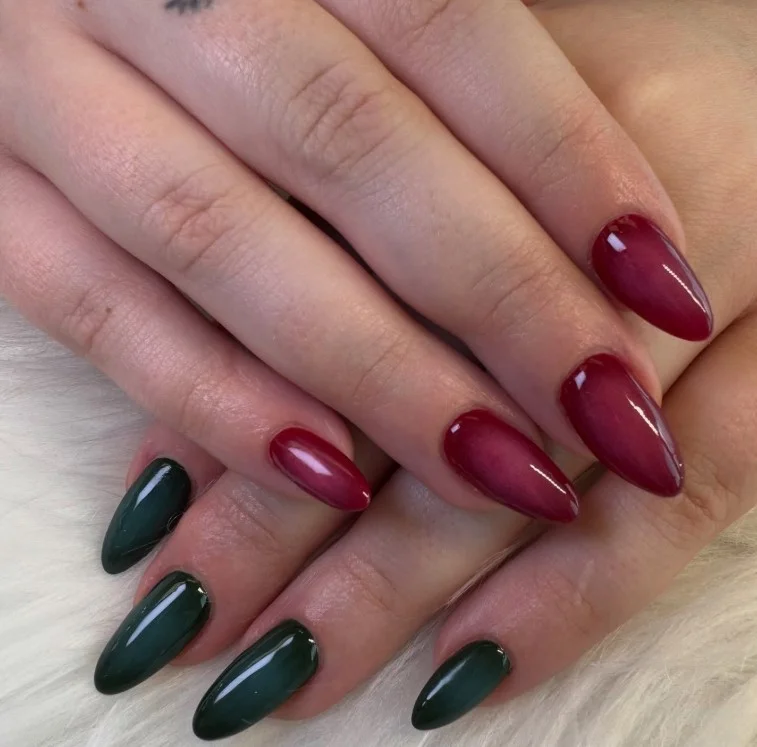 Cute Christmas nail designs with soft red and green aura gradients blended over a sheer nude base.