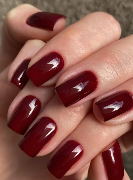 Classic cherry red square nail designs with a rich glossy finish and clean modern shape.