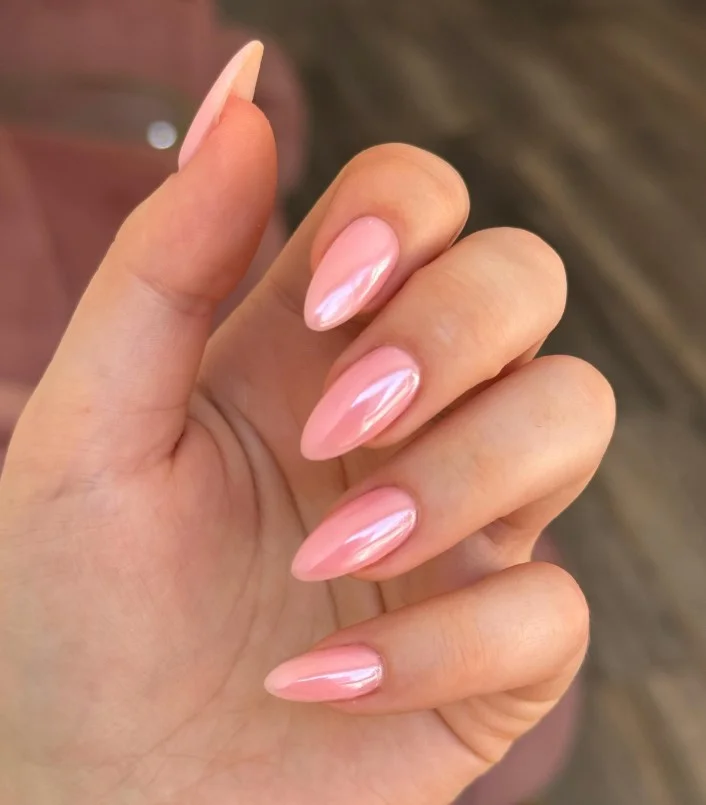 Cute baby pink nail designs with a smooth glossy finish creating a clean and elegant everyday manicure.