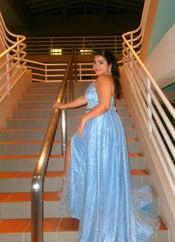 Dusty blue glitter mesh prom dress with subtle sparkle and elegant styling