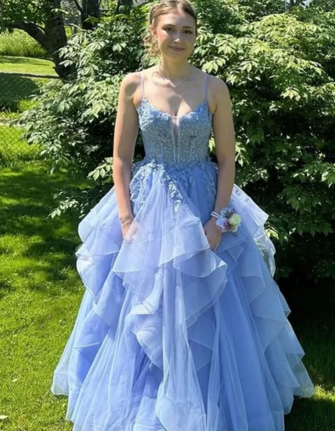 Dusty blue tiered tulle prom dress with flowing layers and princess-inspired style