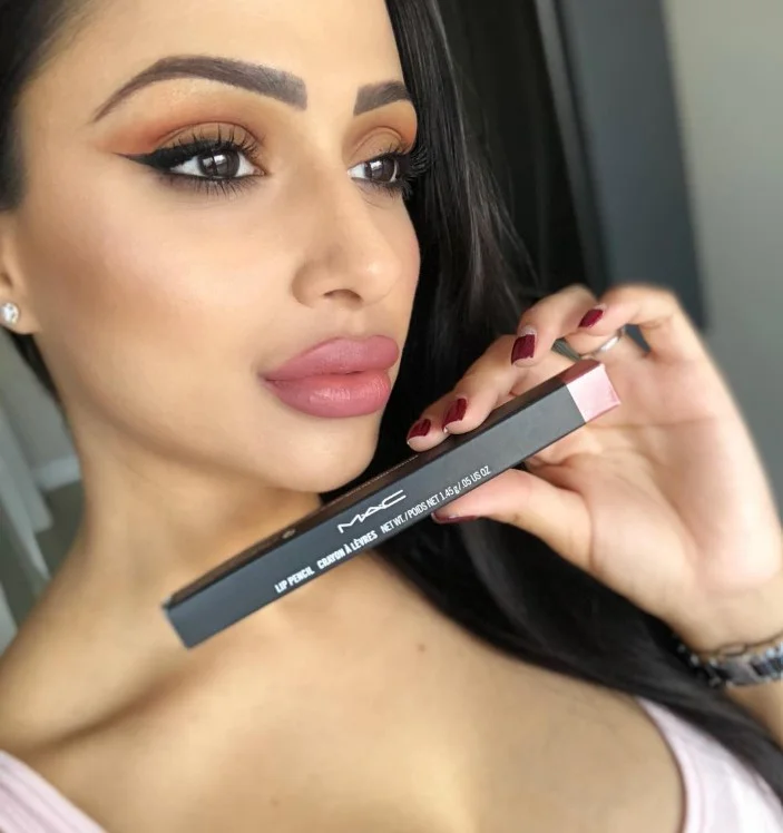 Dusty rose lipstick that beautifully complements light and medium olive skin tones.