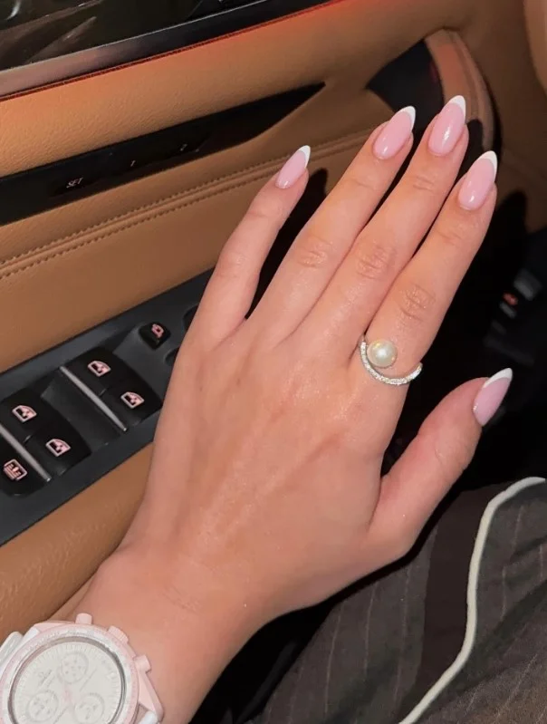 Classic French tip manicure matching every shade of green dress.