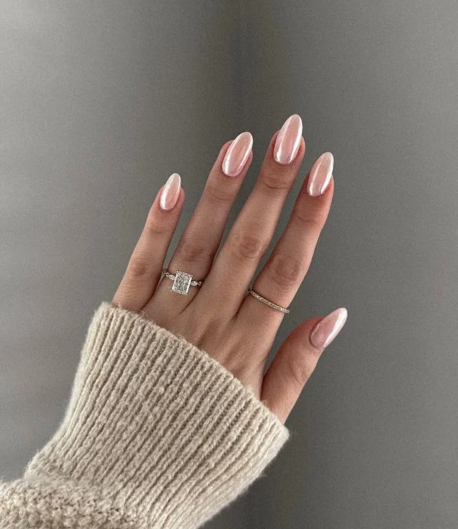 Glazed donut pink nail designs with a luminous pearl shine and smooth glossy finish.