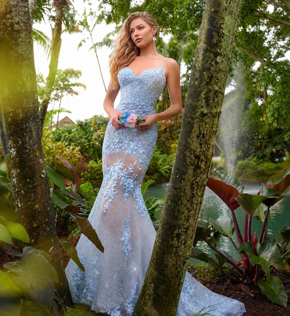 Ice blue glitter mesh prom dress with a flowing train