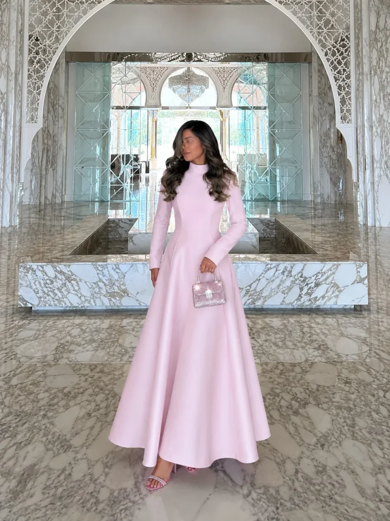 Light pink A-line prom dress outfit with a sparkly mini handbag