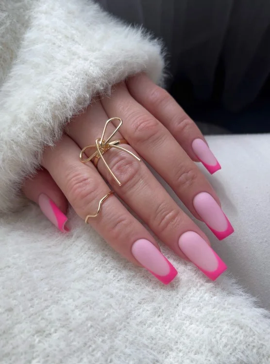 Matte pink nail designs finished with glossy French edges for a modern contrast manicure.