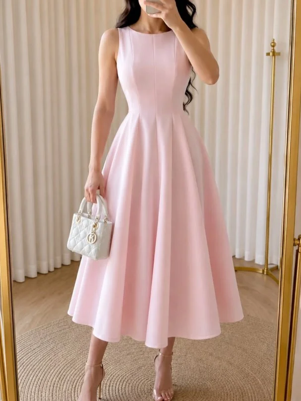 Blush pink midi dress styled with nude and beige pointed-toe heels for a timeless elegant outfit.