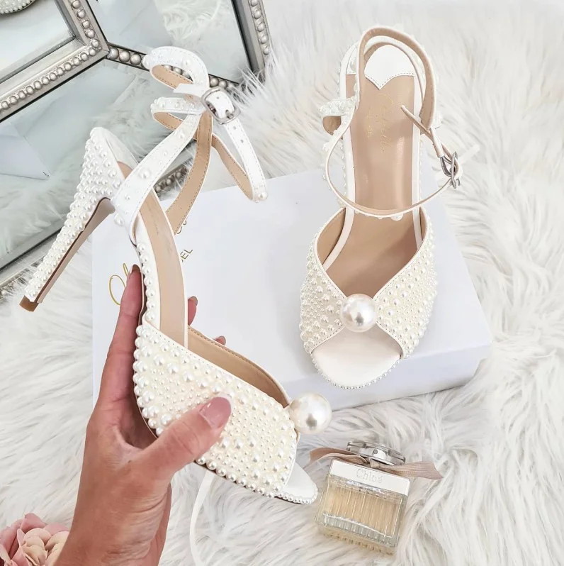 Blush pink dress paired with pearl embellished heels for a bridal shower or wedding celebration.
