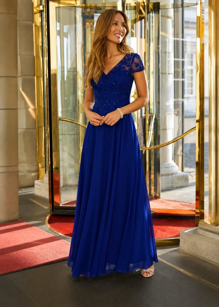Royal blue chiffon prom dress outfit with a pearl bracelet