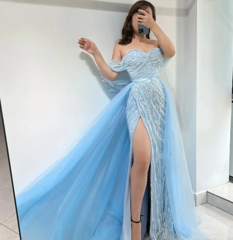 Elegant sky blue mermaid prom dress with soft draping and pointed heels