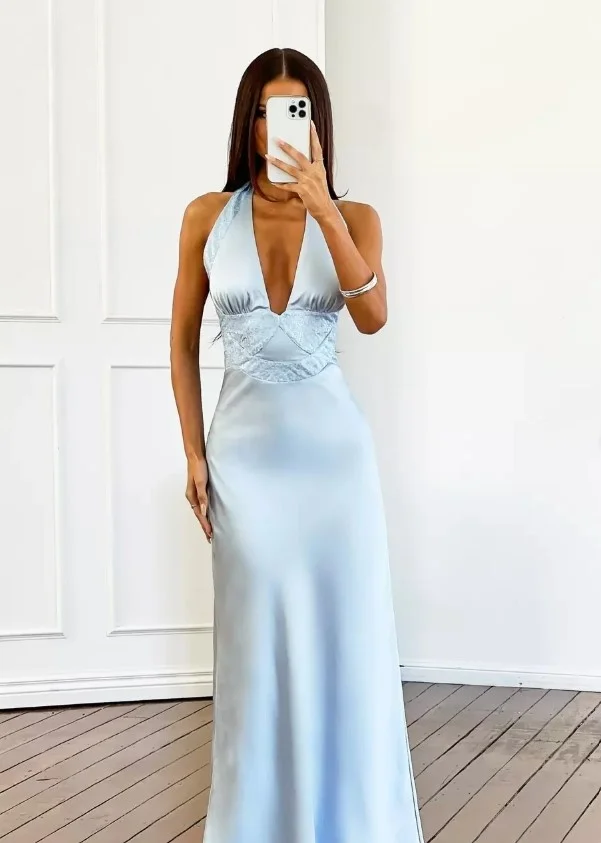 Sky blue satin slip prom dress with silver heels and crystal bracelet