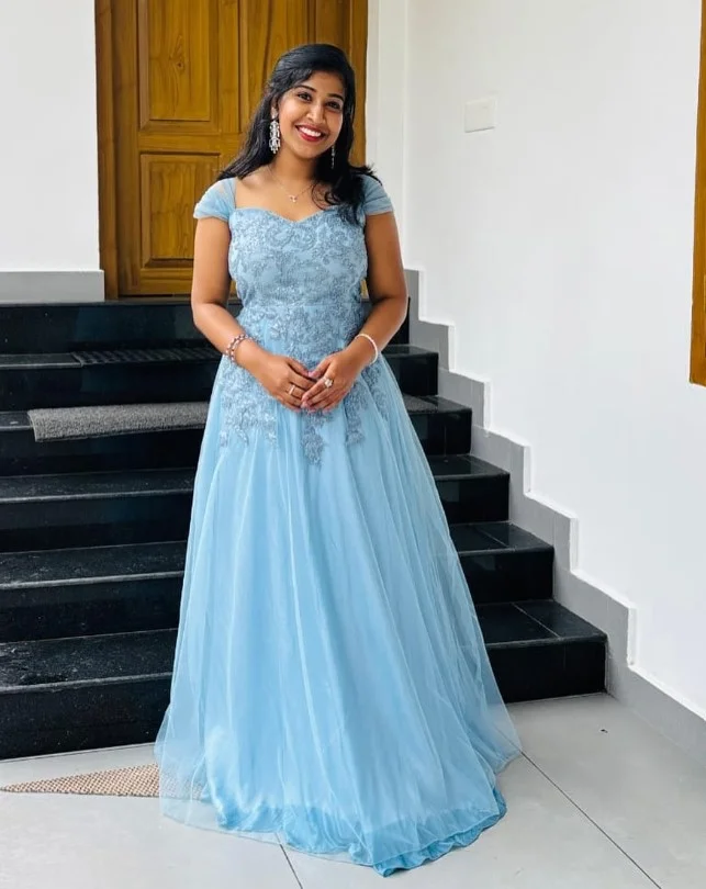 Sky blue tulle ball gown with a princess skirt for a fairytale-inspired prom
