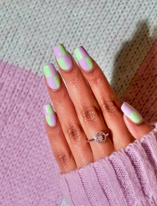 Square nail designs featuring retro checkerboard accent art with clean geometric patterns.