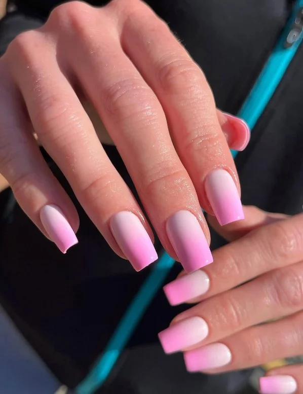 Square ombré nail designs blending blush pink shades with a seamless glossy transition.
