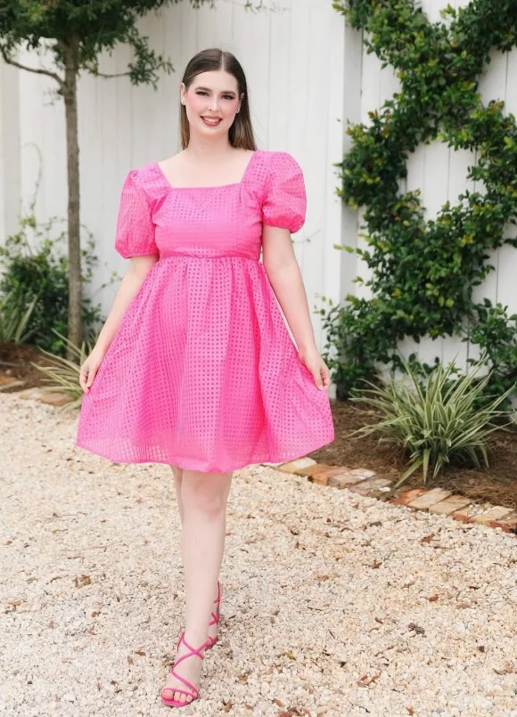Pink dress paired with tonal pink heels for an elegant monochromatic fashion outfit.