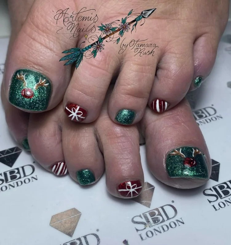 Christmas tree toe nails featuring tiny green trees with festive holiday details