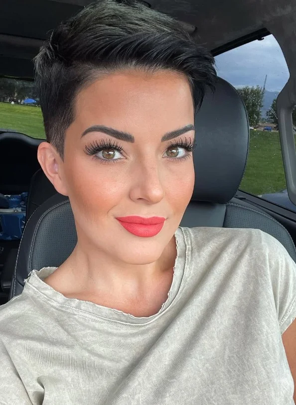 Coral lipstick creating a fresh and bright summer makeup look for fair skin.