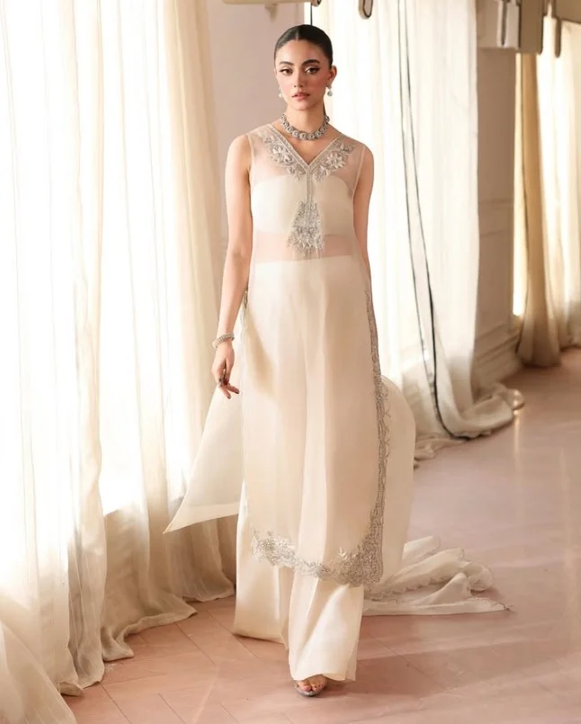 Cream ivory outfit styled on warm skin tone for a soft elegant look