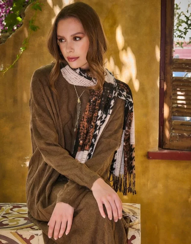 Golden brown clothing creating a soft rich finish for warm skin tone
