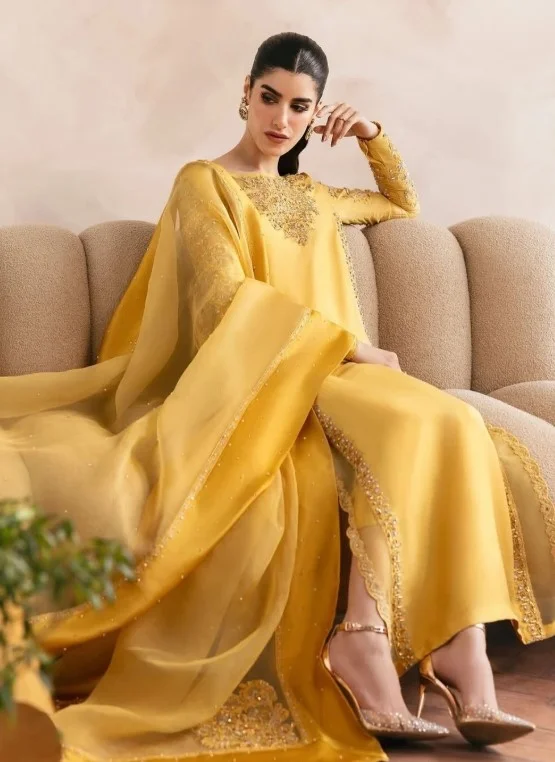 Golden yellow clothing creating a radiant statement look on warm skin