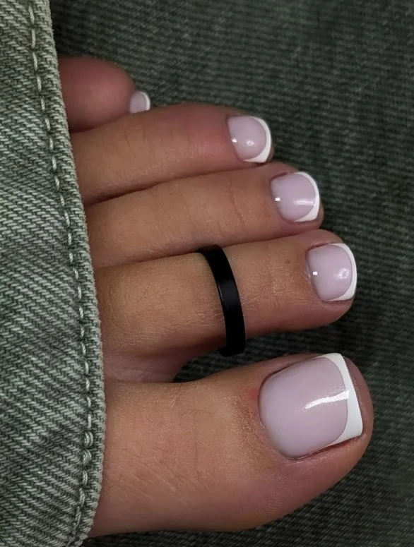 Icy white French toe nails with crisp tips
