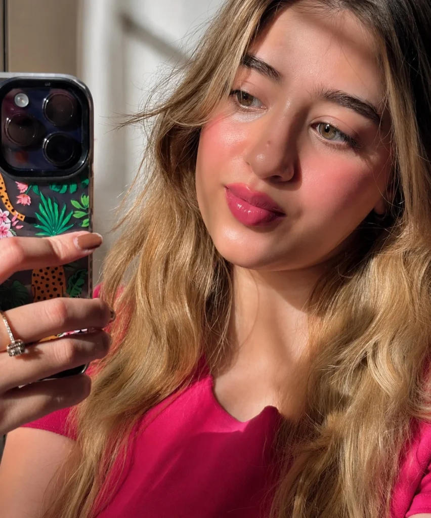 Mauve berry blush creating a soft romantic makeup look for olive skin