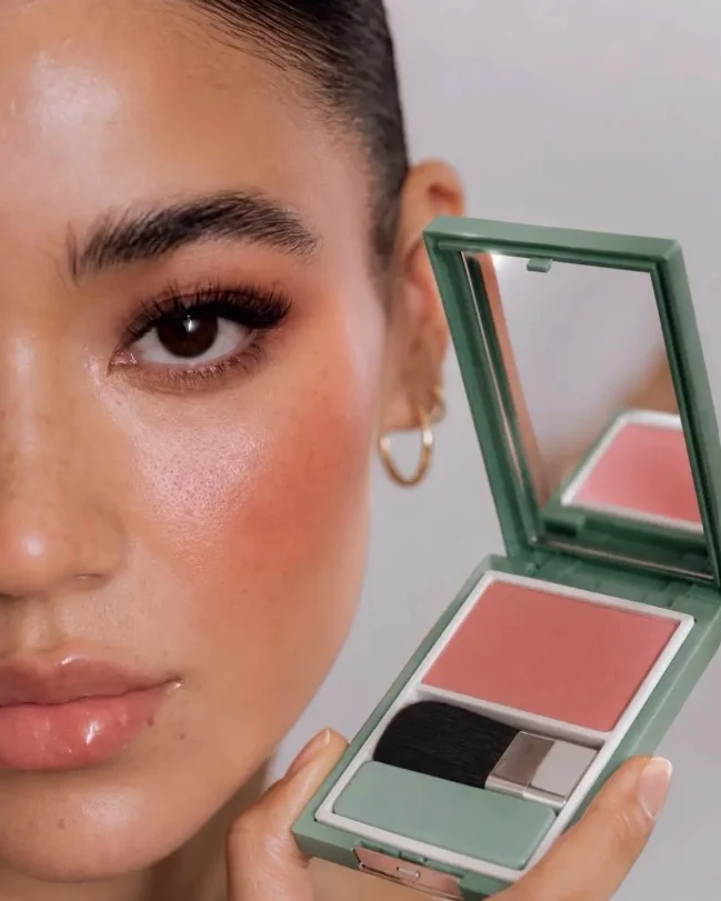 Neutral peach blush creating an effortless everyday makeup look for olive skin