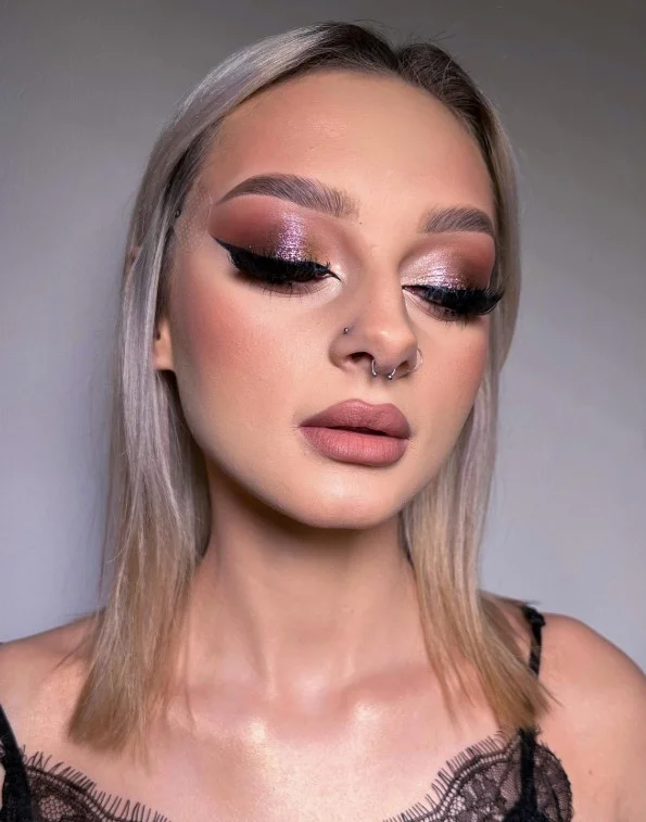 Pinky brown lipstick creating a polished neutral lip for fair skin.